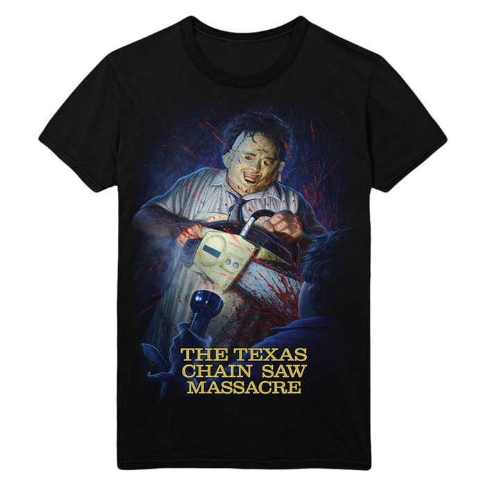 A black short-sleeve graphic t-shirt featuring a horror movie print of Michael Myers holding a chainsaw, with the text 'THE TEXAS CHAIN SAW MASSACRE' in yellow at the bottom.