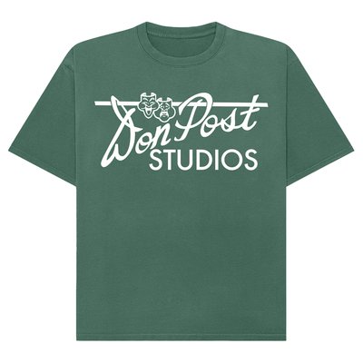 Green t-shirt with 'Don Post Studios' logo