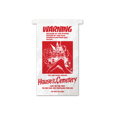 Warning label for 'House on the Cemetery' with red text and graphic on a white background