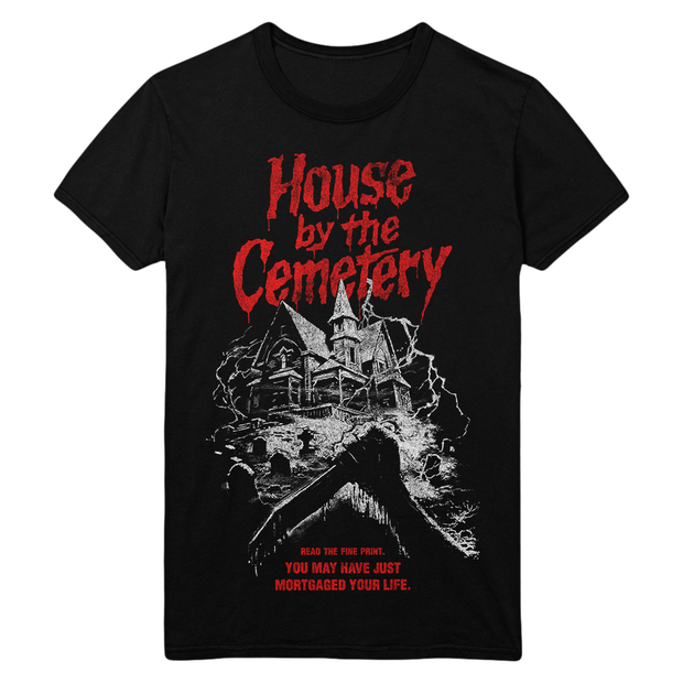 Black t-shirt with a graphic of a haunted house and text 'House by the Cemetery'.