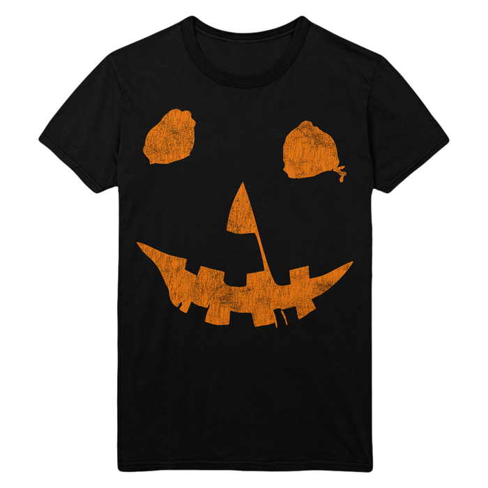 A black short-sleeve crewneck t-shirt featuring a distressed orange jack-o'-lantern face from John Carpenter's Halloween 1978 graphic on the front, displayed against a solid white background.