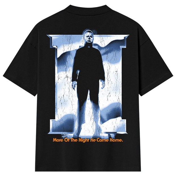 A black short-sleeve t-shirt shown from the back, featuring a large ...