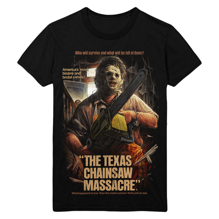 A black short-sleeve graphic t-shirt featuring a horror movie print of Leatherface holding a chainsaw, with the text 'The Texas Chainsaw Massacre' on a white background.