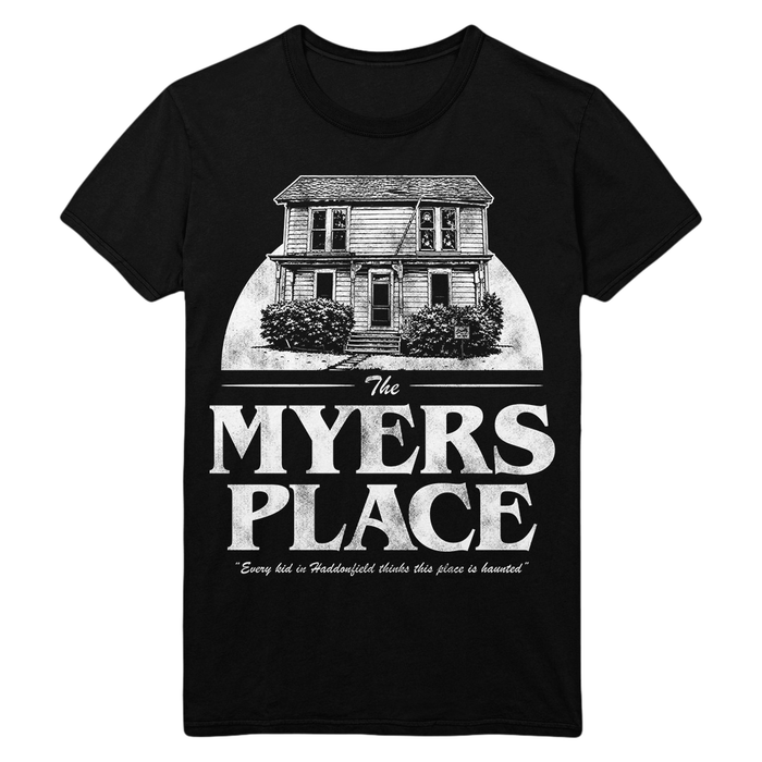 A black short-sleeve crewneck t-shirt featuring a distressed white graphic print of 'The Myers Place' house from John Carpenter's Halloween, with the text 'The MYERS PLACE' and a quote below.