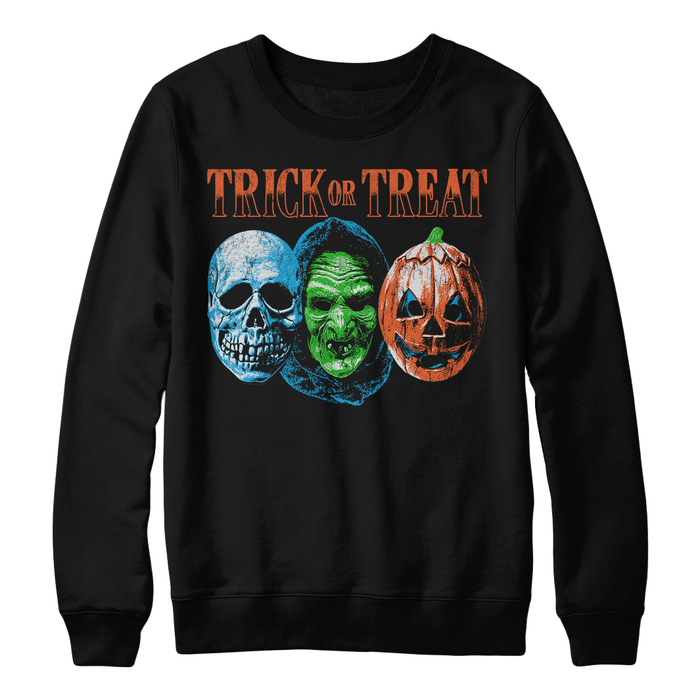 A black crewneck sweatshirt featuring a 'Trick or Treat' Halloween graphic with a blue skull, a green witch's face, and an orange jack-o'-lantern pumpkin.